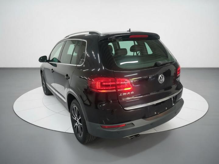 Tiguan 2015 1.8TSI AT RWD Luxury photo 4