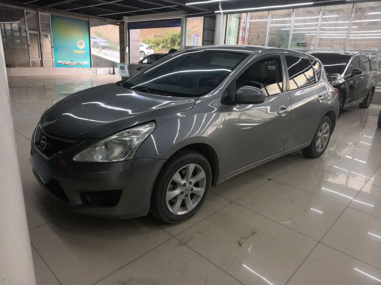Tiida 2011 1.6L CVT Comfort photo 3