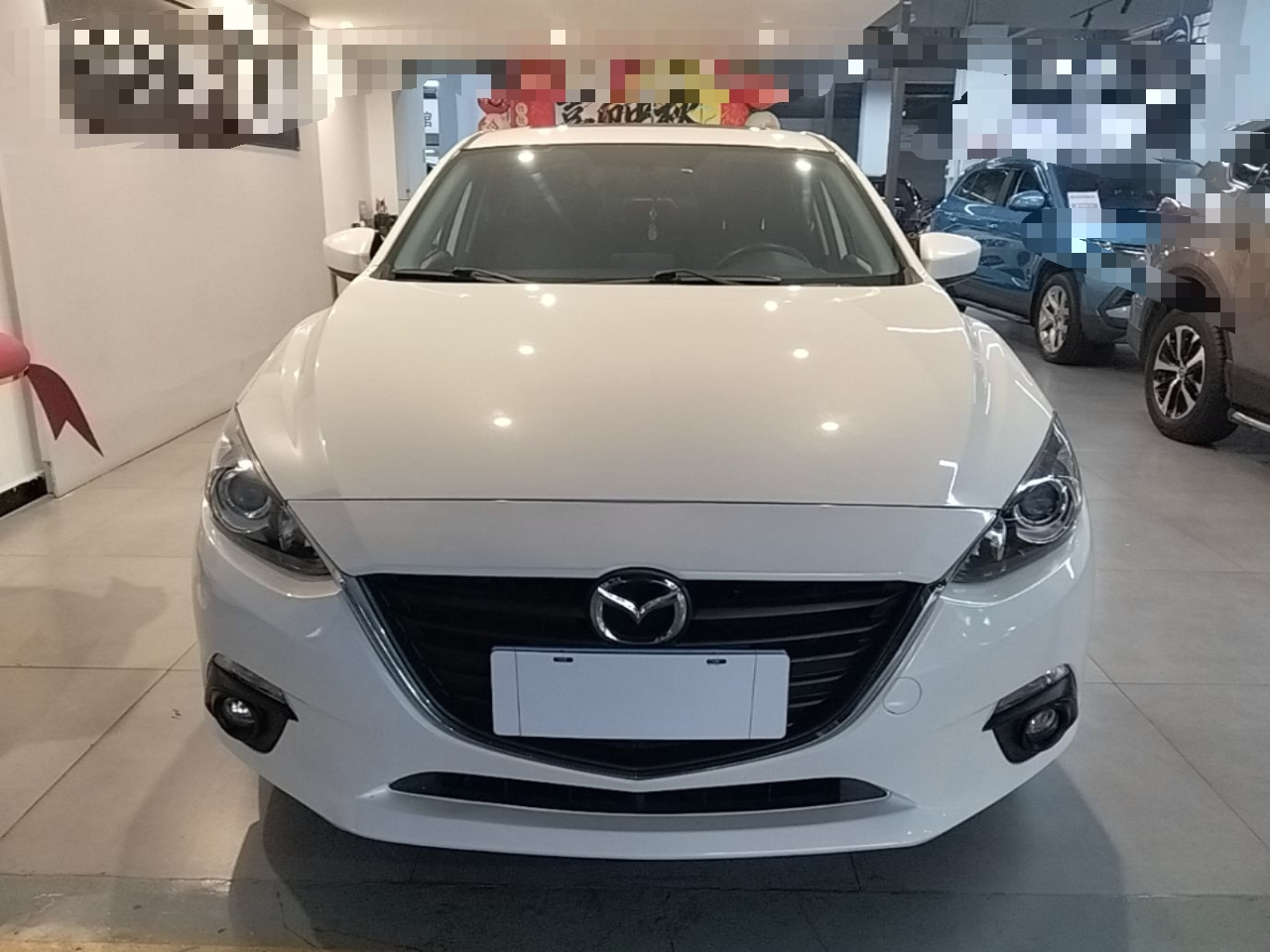 3 Axela 2016 Sedan 1.5L AT Luxury photo 2